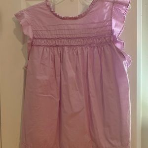 Cute lilac sleeveless blouse